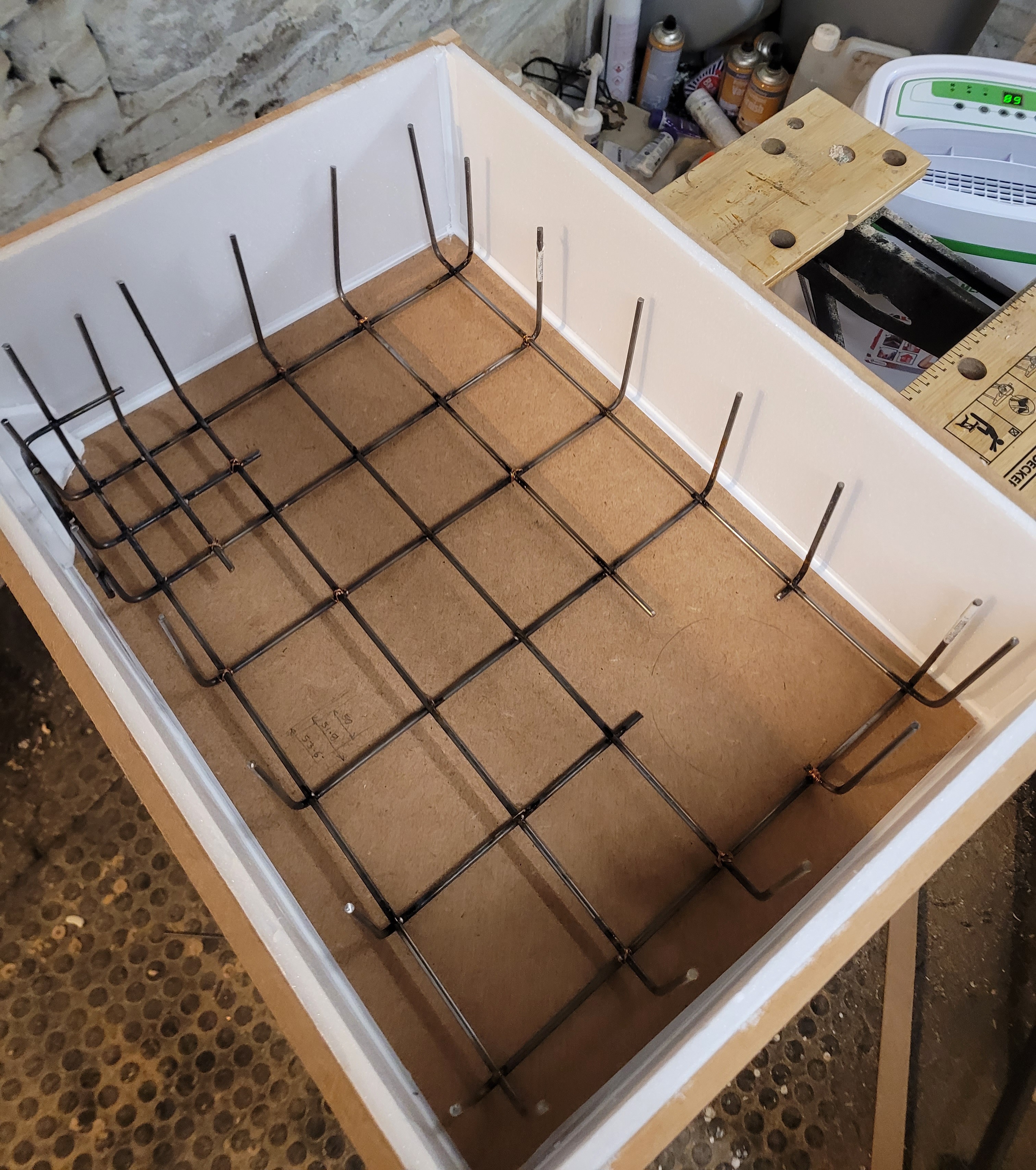 The rebar cage inside the form, awaiting the first pour