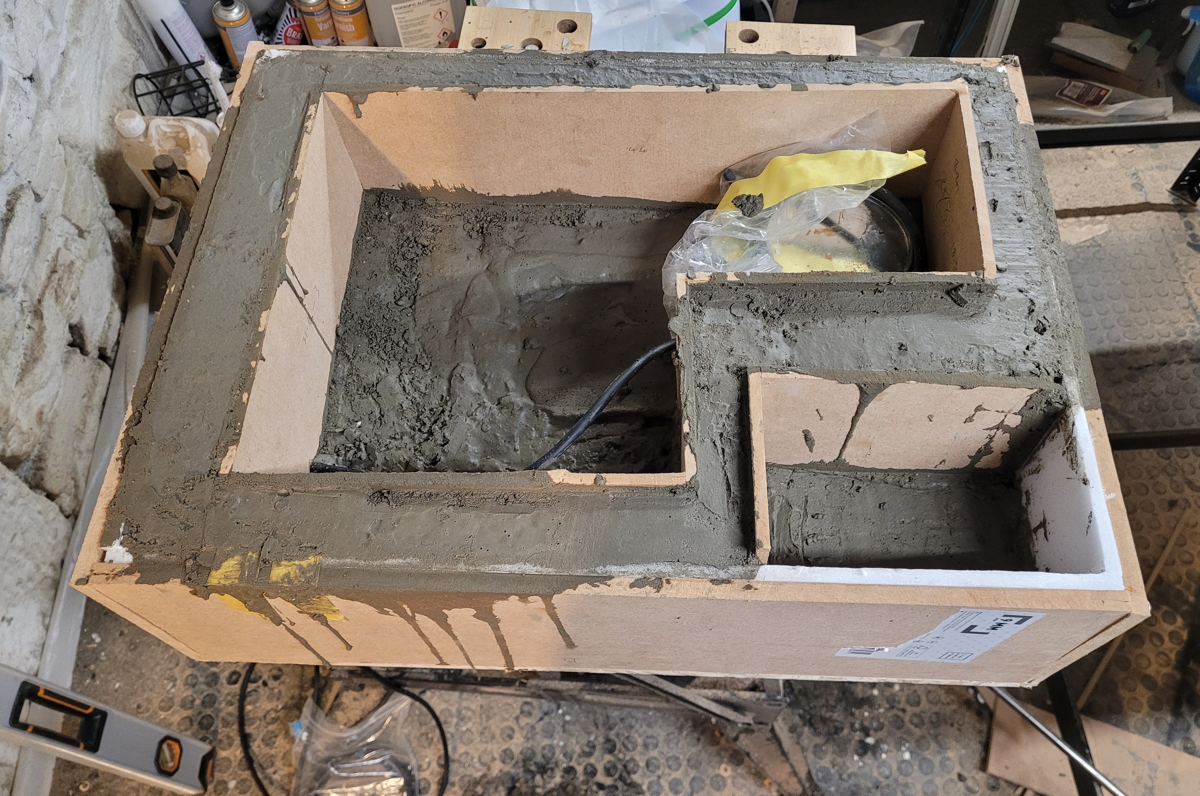 Concrete laptop stand still in mold