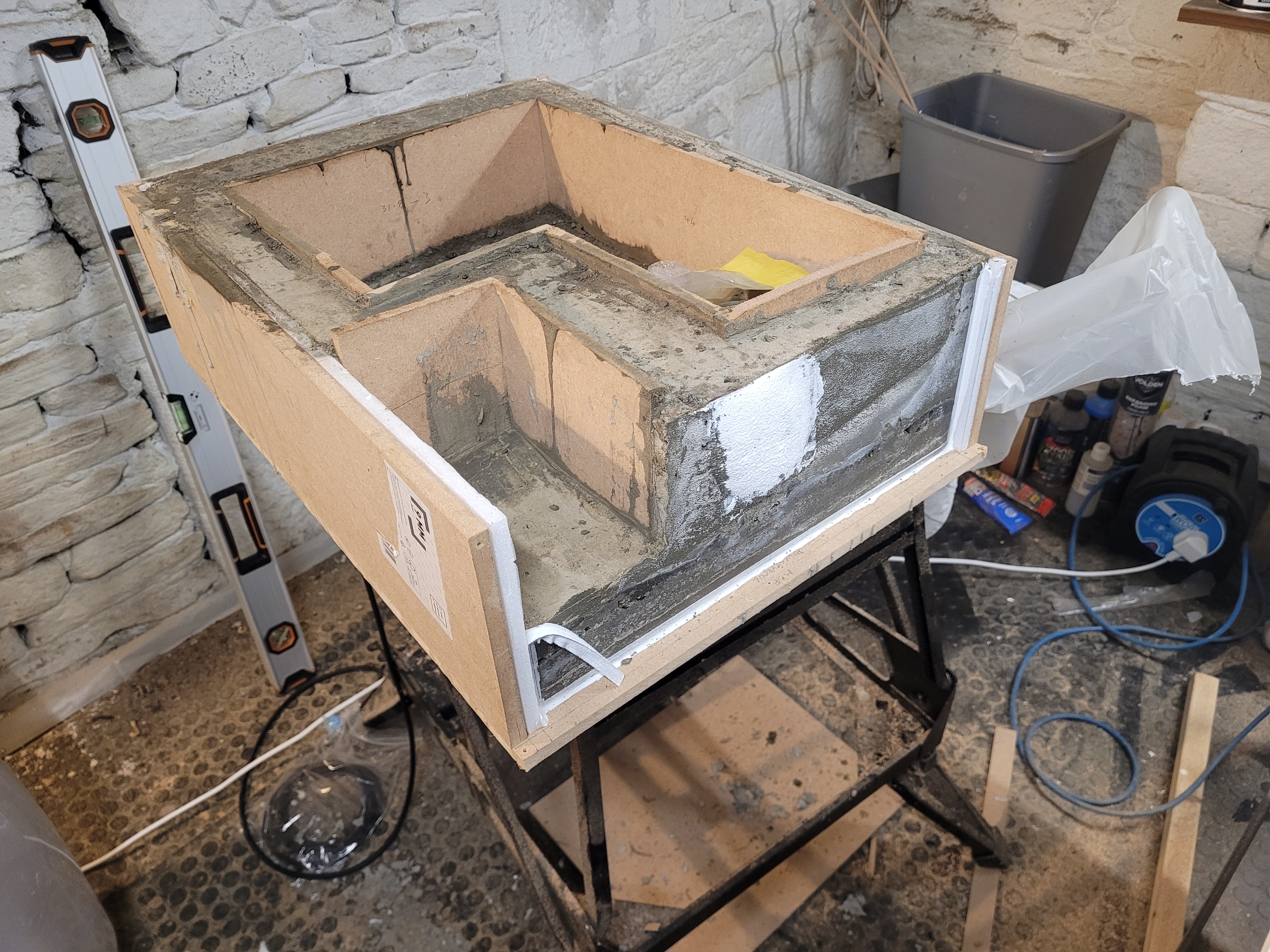 Concrete laptop stand still in mold