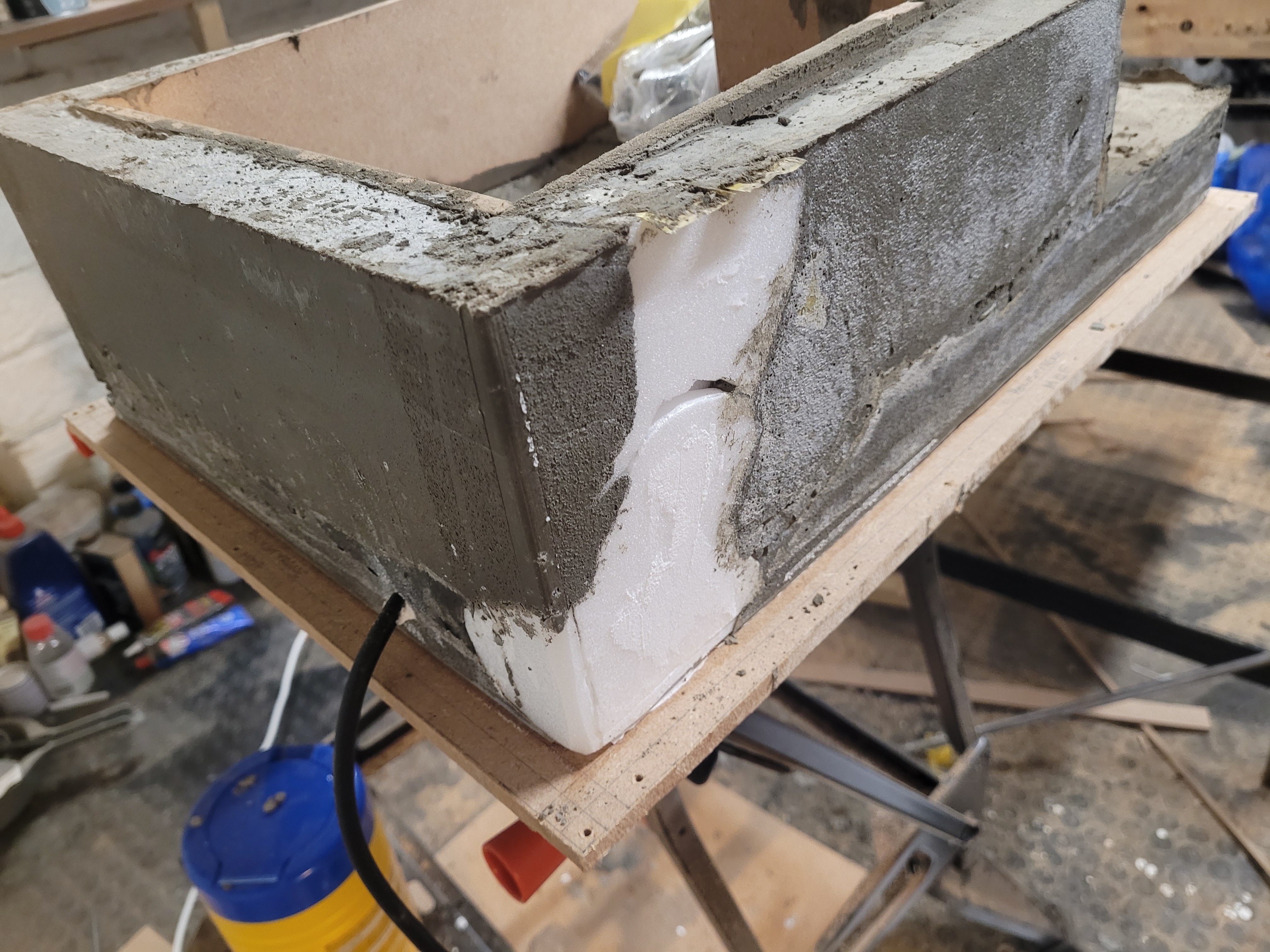 Concrete laptop stand still in mold